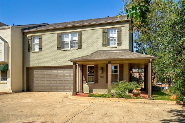 view of front of house featuring a porch and a garage