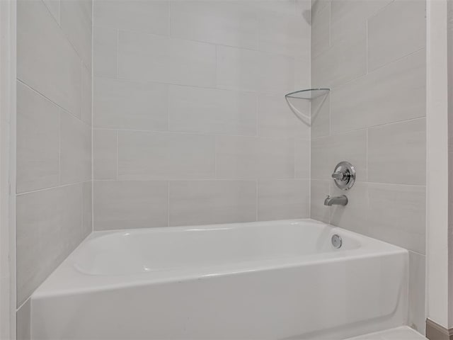 bathroom featuring a tub