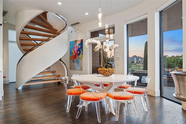 dining area featuring dark hardwood / wood-style flooring