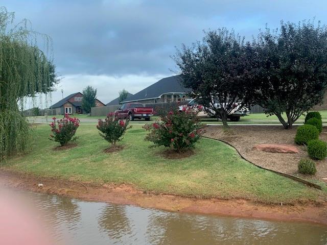 805 Scully Rd, Yukon, OK 73099 - view of grassy yard featuring a water view