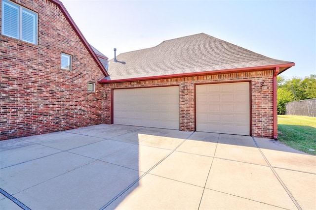 exterior space featuring a garage