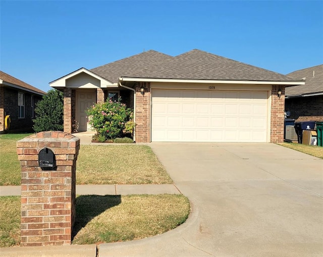 single story home featuring a front yard and a garage