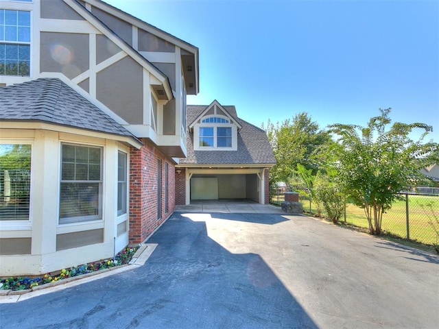 view of home's exterior with a garage