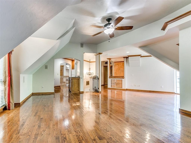 bonus room with ceiling fan, wood-type flooring, and lofted ceiling