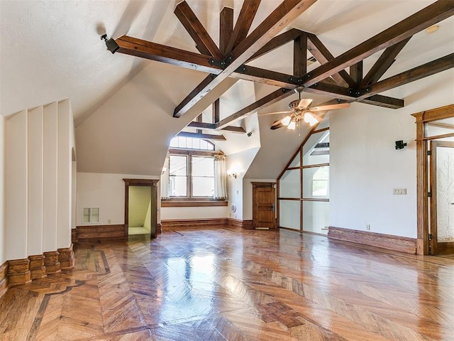 additional living space with beam ceiling, plenty of natural light, and high vaulted ceiling