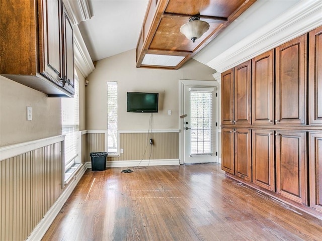 interior space with hardwood / wood-style floors and lofted ceiling