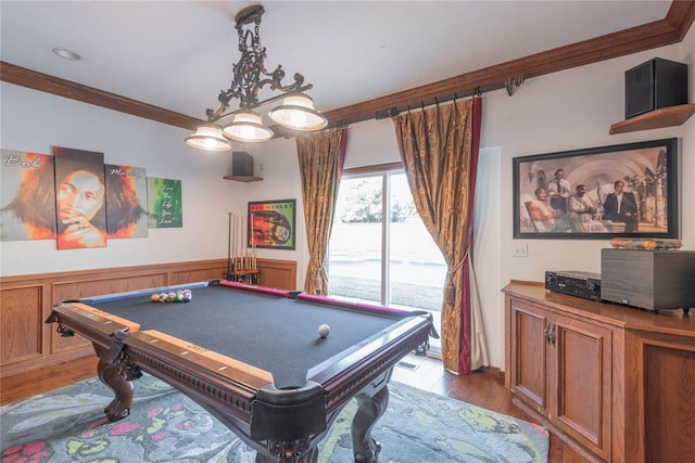 recreation room with light hardwood / wood-style floors, ornamental molding, and billiards