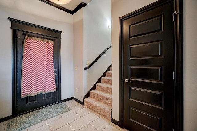 entryway with crown molding