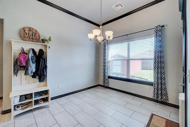 mudroom with an inviting chandelier and ornamental molding