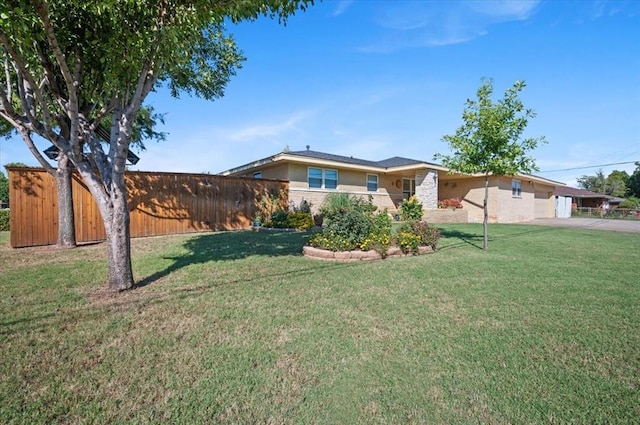 ranch-style house with a front yard