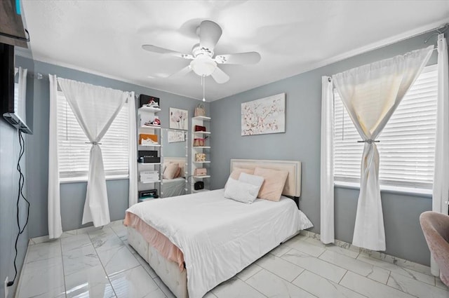 bedroom featuring ceiling fan