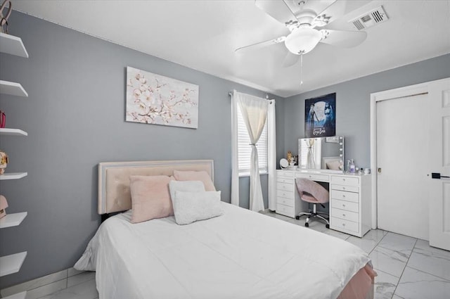 bedroom featuring ceiling fan