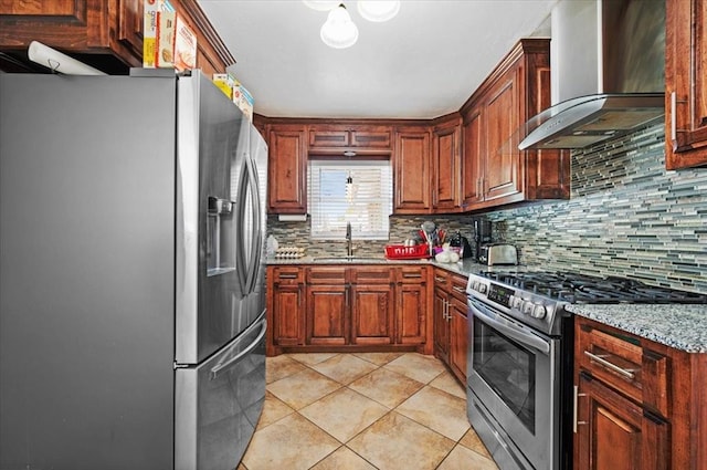 kitchen with backsplash, wall chimney range hood, sink, light stone countertops, and stainless steel appliances