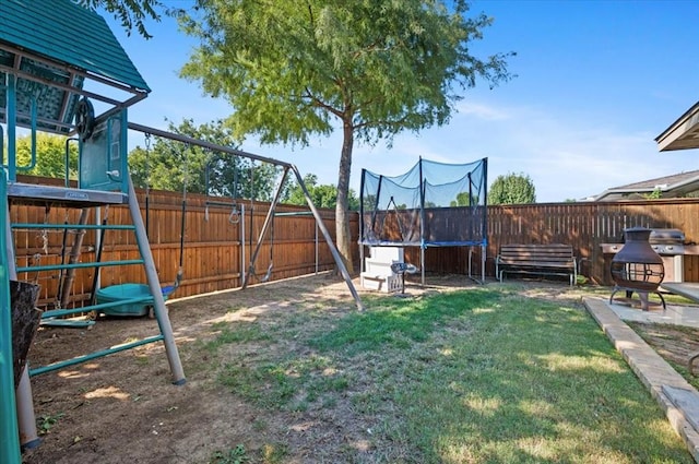 view of yard featuring a trampoline