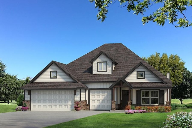 view of front facade featuring a garage, driveway, a front lawn, and brick siding