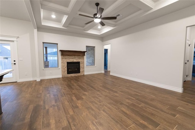 unfurnished living room featuring a ceiling fan, coffered ceiling, dark wood finished floors, and baseboards