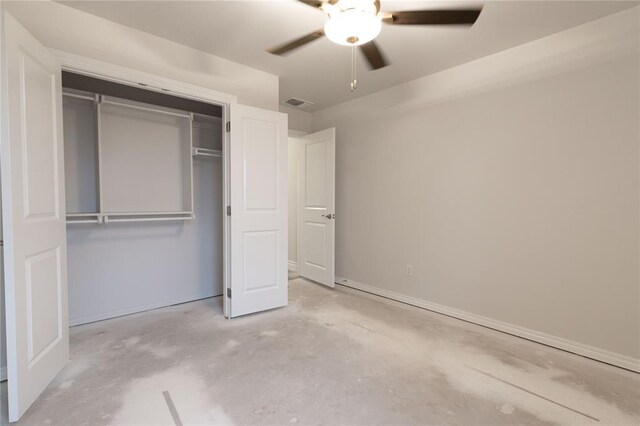 unfurnished bedroom with visible vents, a ceiling fan, a closet, concrete floors, and baseboards