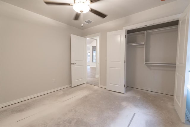 unfurnished bedroom with visible vents, unfinished concrete flooring, baseboards, a closet, and a ceiling fan