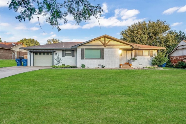 single story home featuring a garage and a front yard