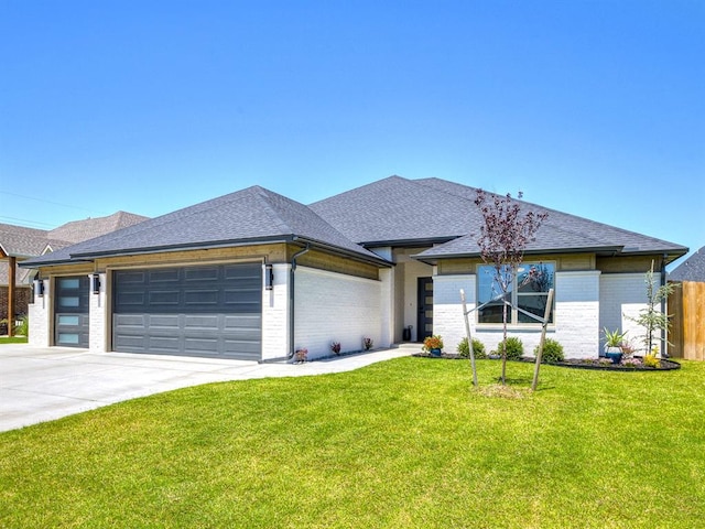 prairie-style house with a front yard