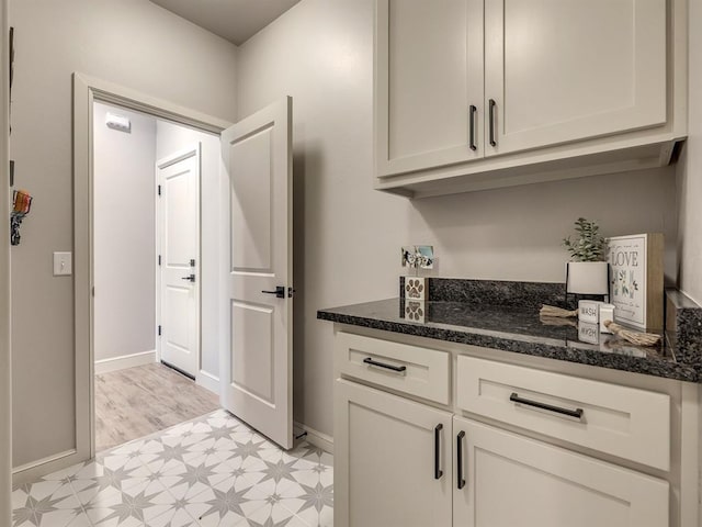 kitchen with dark stone counters