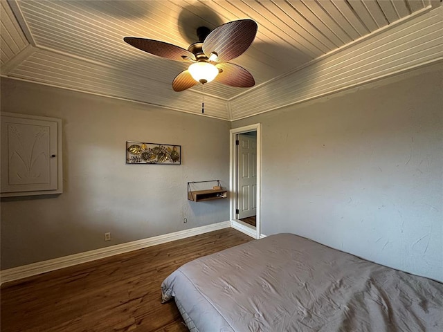 unfurnished bedroom with hardwood / wood-style floors, ceiling fan, and wood ceiling