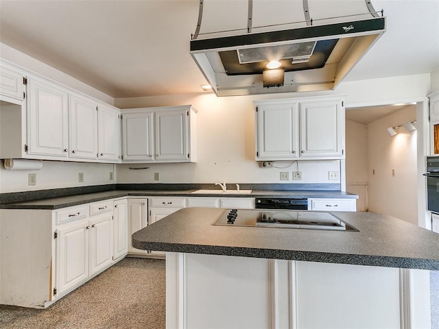 kitchen featuring white cabinets, black appliances, and sink