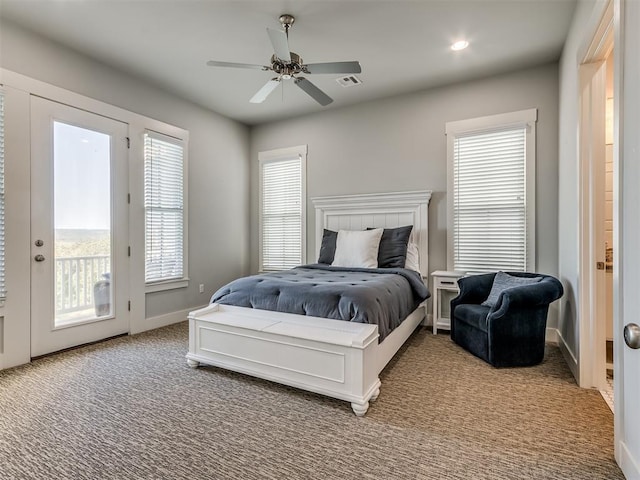 bedroom with access to exterior, ceiling fan, and light carpet