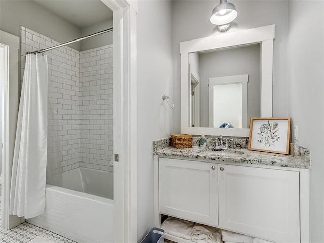 bathroom featuring tile patterned floors, vanity, and shower / tub combo