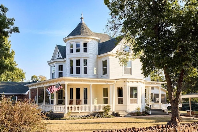 back of house with a porch