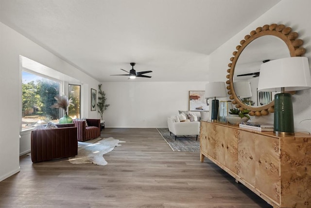 sitting room with wood-type flooring