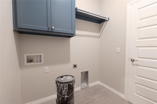 washroom with washer hookup, cabinet space, electric dryer hookup, and baseboards