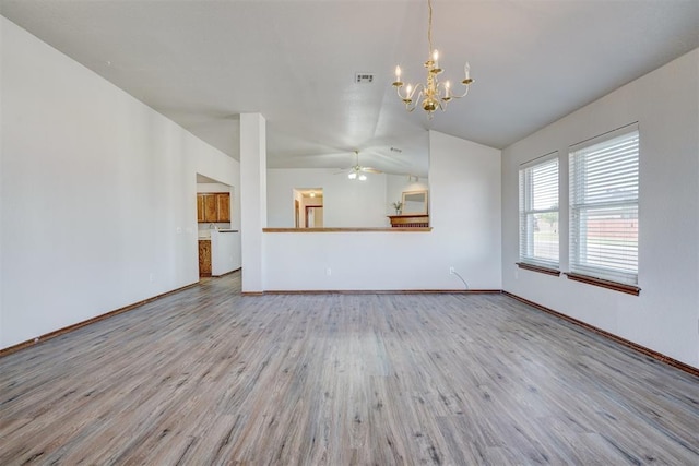 unfurnished living room with light hardwood / wood-style flooring, ceiling fan with notable chandelier, and lofted ceiling