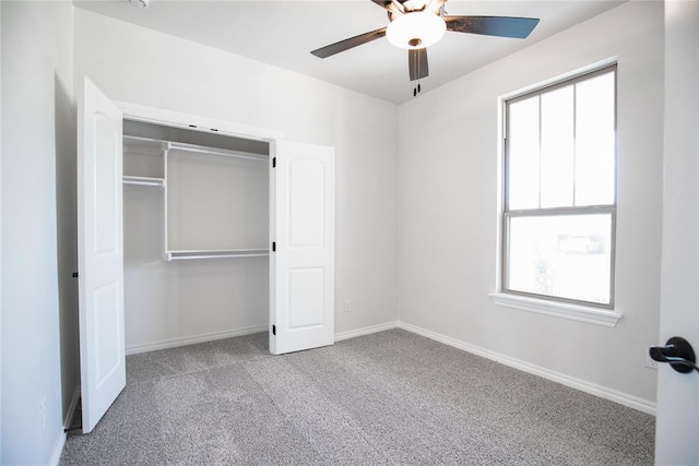 9312 Poppey Pl, Yukon, OK 73099 - unfurnished bedroom featuring carpet flooring, baseboards, a closet, and ceiling fan