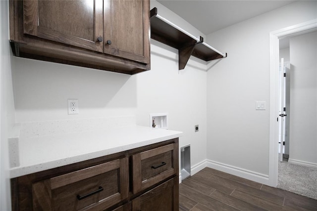 9312 Poppey Pl, Yukon, OK 73099 - laundry area with cabinet space, hookup for an electric dryer, hookup for a washing machine, baseboards, and wood finish floors