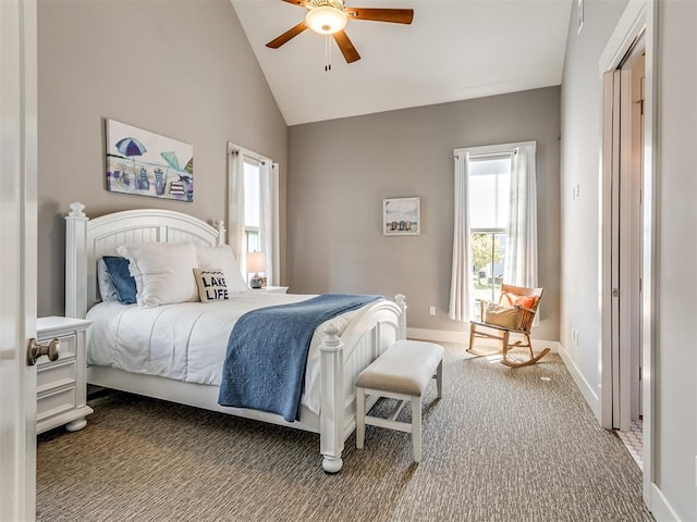 carpeted bedroom featuring ceiling fan and vaulted ceiling