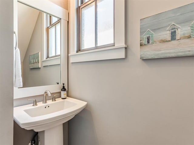 bathroom with vaulted ceiling