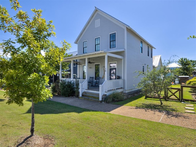 view of front of house featuring a porch and a front yard