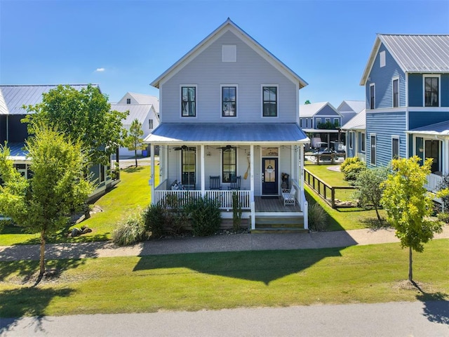 view of front of home featuring a porch and a front lawn