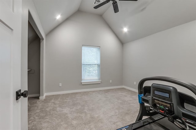 carpeted office featuring ceiling fan and lofted ceiling