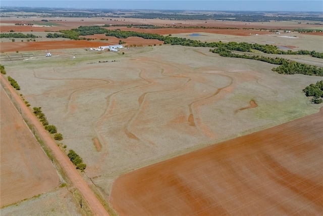 birds eye view of property featuring a rural view