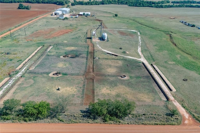 birds eye view of property featuring a rural view