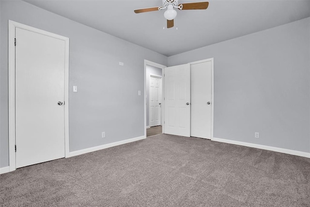 unfurnished bedroom featuring carpet flooring and ceiling fan