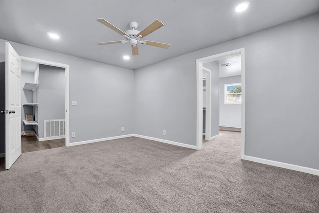 unfurnished bedroom featuring visible vents, carpet, baseboards, ceiling fan, and recessed lighting