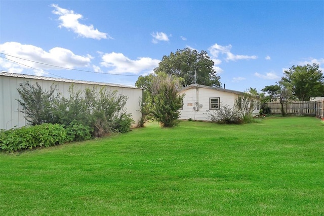 view of yard with fence