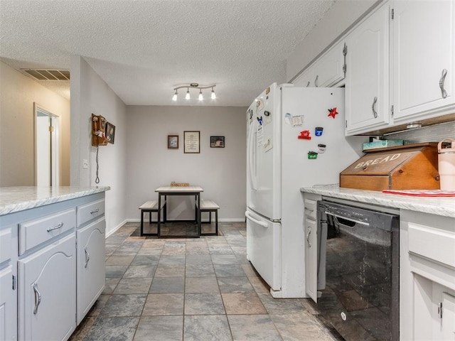 kitchen featuring white cabinetry, white fridge, a textured ceiling, and black dishwasher