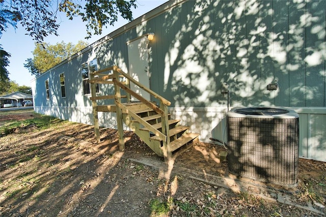 view of home's exterior featuring central air condition unit