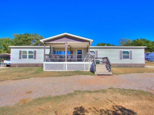 manufactured / mobile home featuring a porch