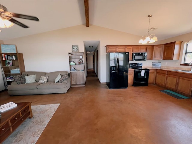 kitchen featuring ceiling fan with notable chandelier, pendant lighting, sink, vaulted ceiling with beams, and black appliances