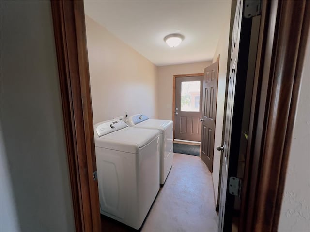 laundry room featuring washer and clothes dryer